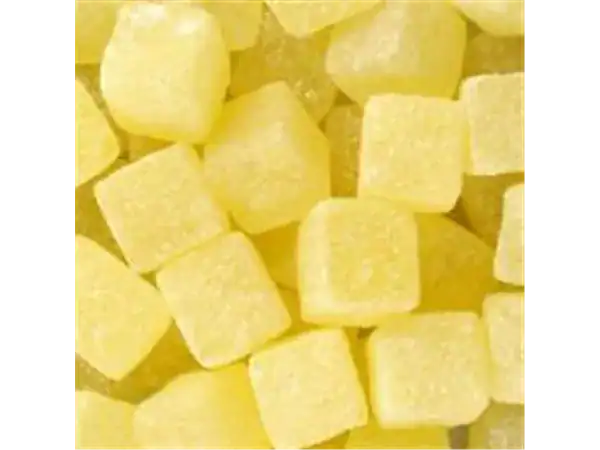 Bright yellow lemon-flavored candy cubes for confectionery lovers.