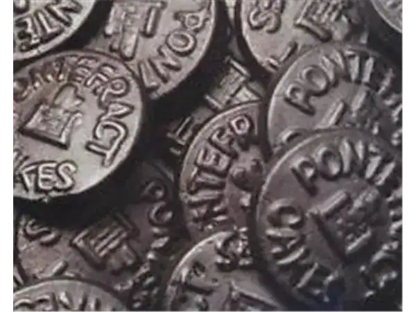 Close-up of Roch Sweets chocolate coin wrappers, appealing and nostalgic snack image.