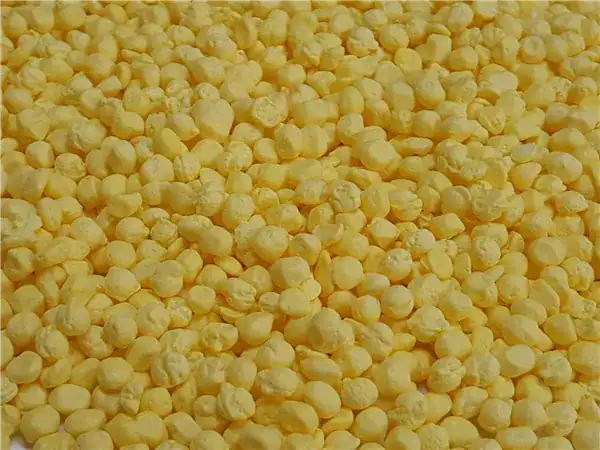 Bright yellow popcorn for gourmet snacking and dessert toppings.