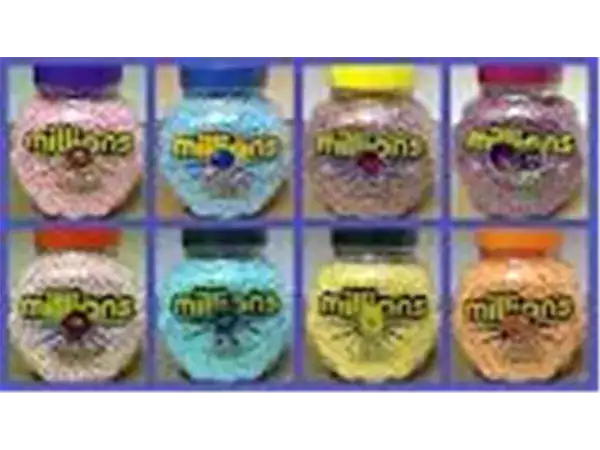 Colorful cake mixes in jars for baking projects. Variety of flavors with bright, attractive packaging. Perfect for homemade desserts.