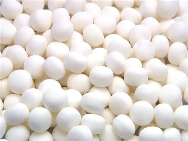 Close-up of white peppermint candies for fresh breath and candy lovers.