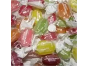 Vibrant assorted Roch Sweets candies with fruity flavors, wrapped in white paper for a delightful treat.