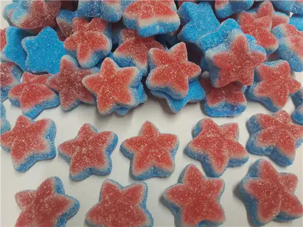 Delicious blue and red star-shaped sour gummies with sugary coating. Perfect for candy lovers and party treats.
