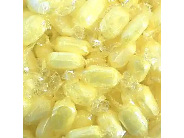 Bright yellow lemon-flavored hard candies, individually wrapped for freshness.
